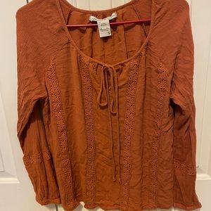 Burnt orange blouse